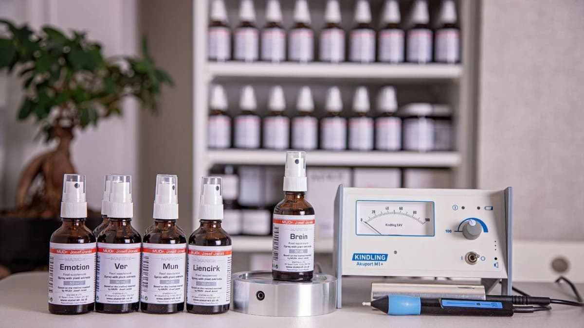 The Dr. Josef Jonas informational spray bottles beside the EAV apparatus